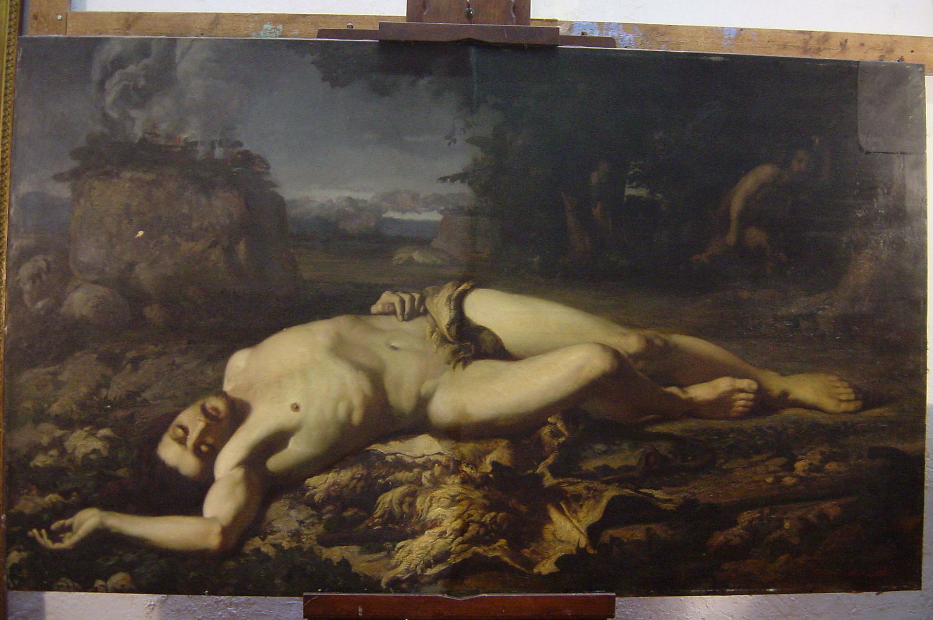 Vista general de la pintura a l'oli de Martí Alzina al taller, abans de la intervenció
